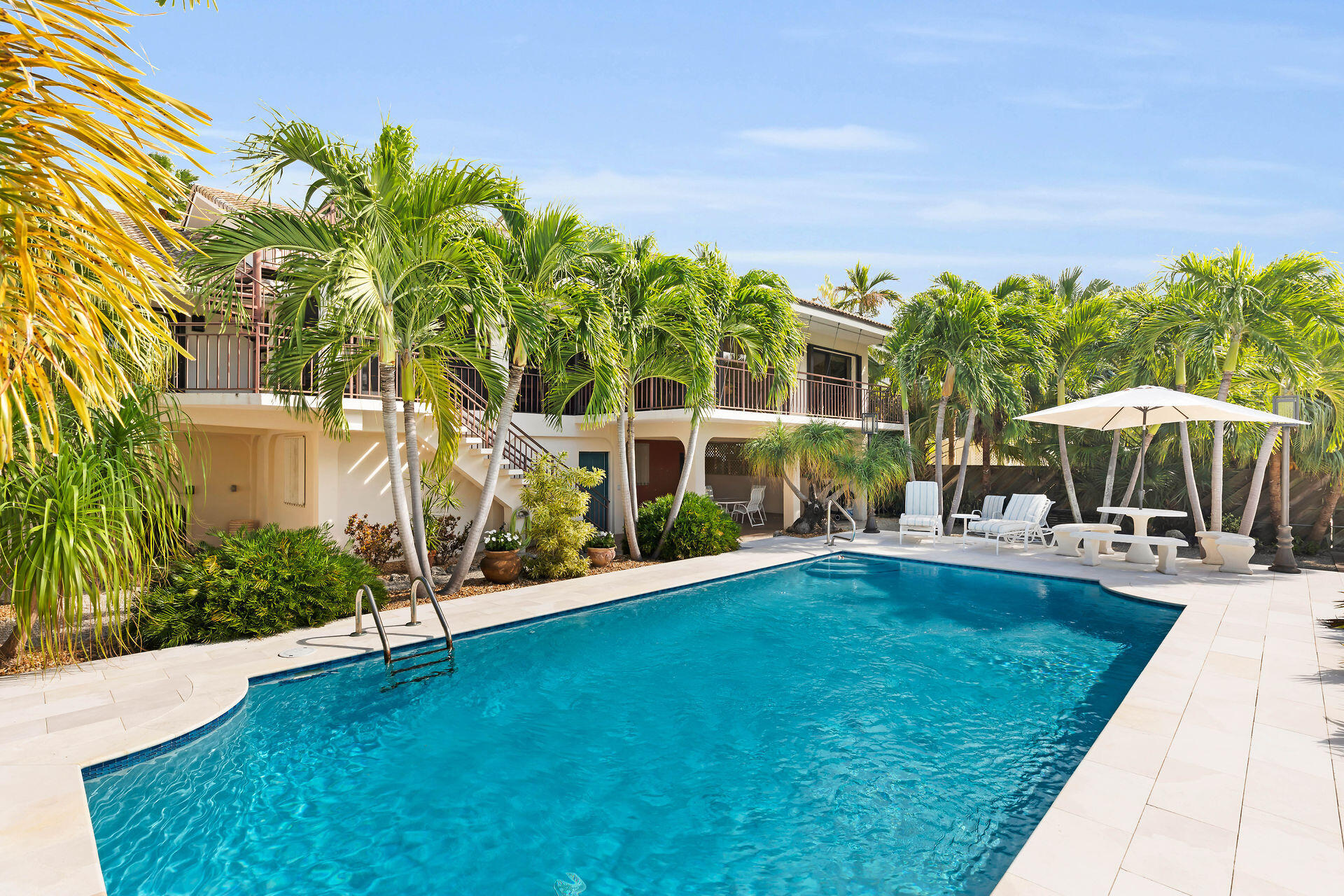701 12th Street Key Colony Beach, FL 33051 - Photo 1 of 48 a view of a garden