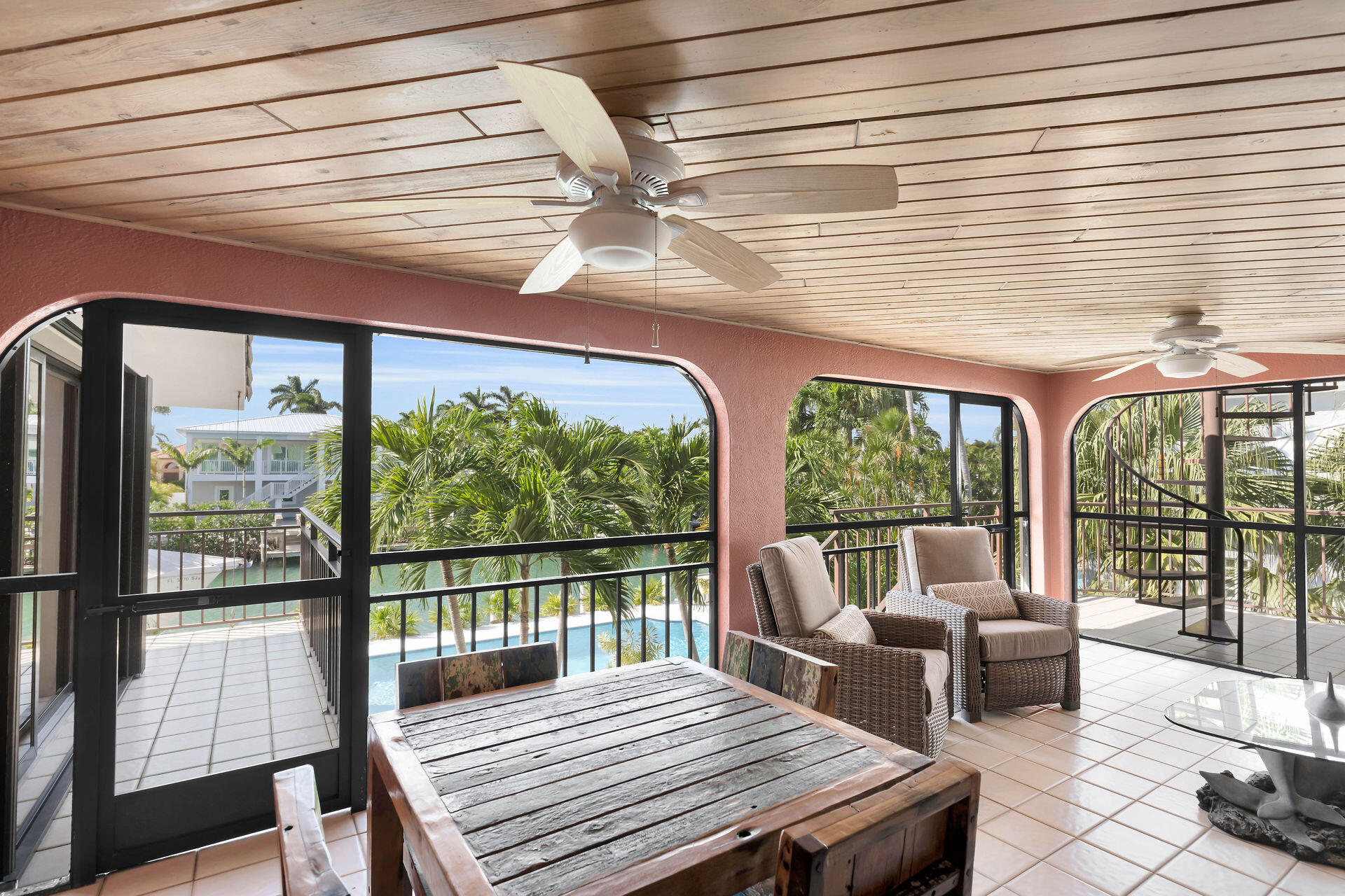 701 12th Street Key Colony Beach, FL 33051 - Photo 14 of 48 a living room with furniture and a floor to ceiling window
