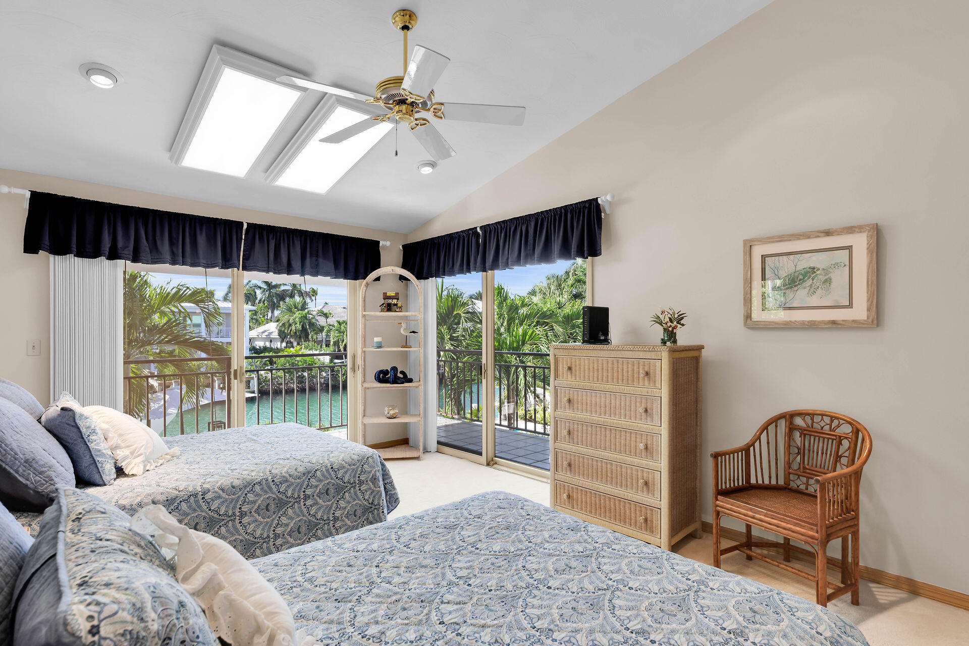 701 12th Street Key Colony Beach, FL 33051 - Photo 33 of 48 a bedroom with a bed and a chair