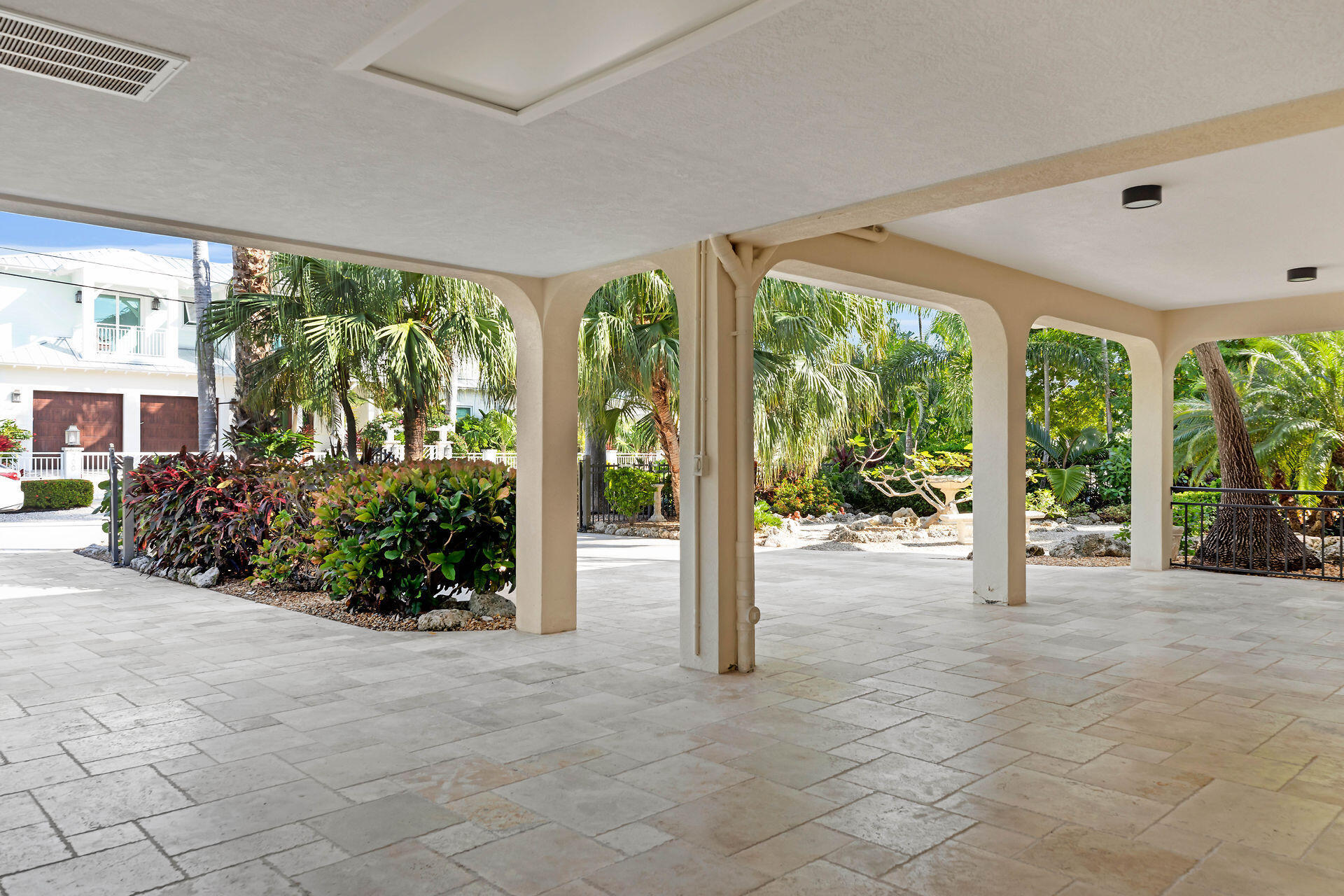 701 12th Street Key Colony Beach, FL 33051 - Photo 46 of 48 a view of a garden with an outdoor seating space