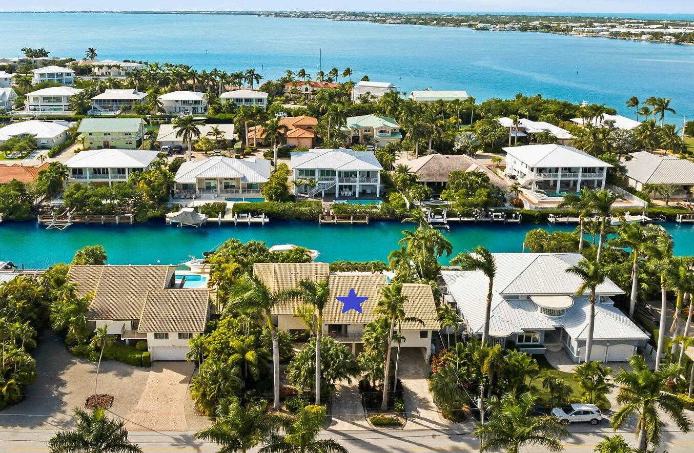 701 12th Street Key Colony Beach, FL 33051 - Photo 6 of 48 an aerial view of multiple house
