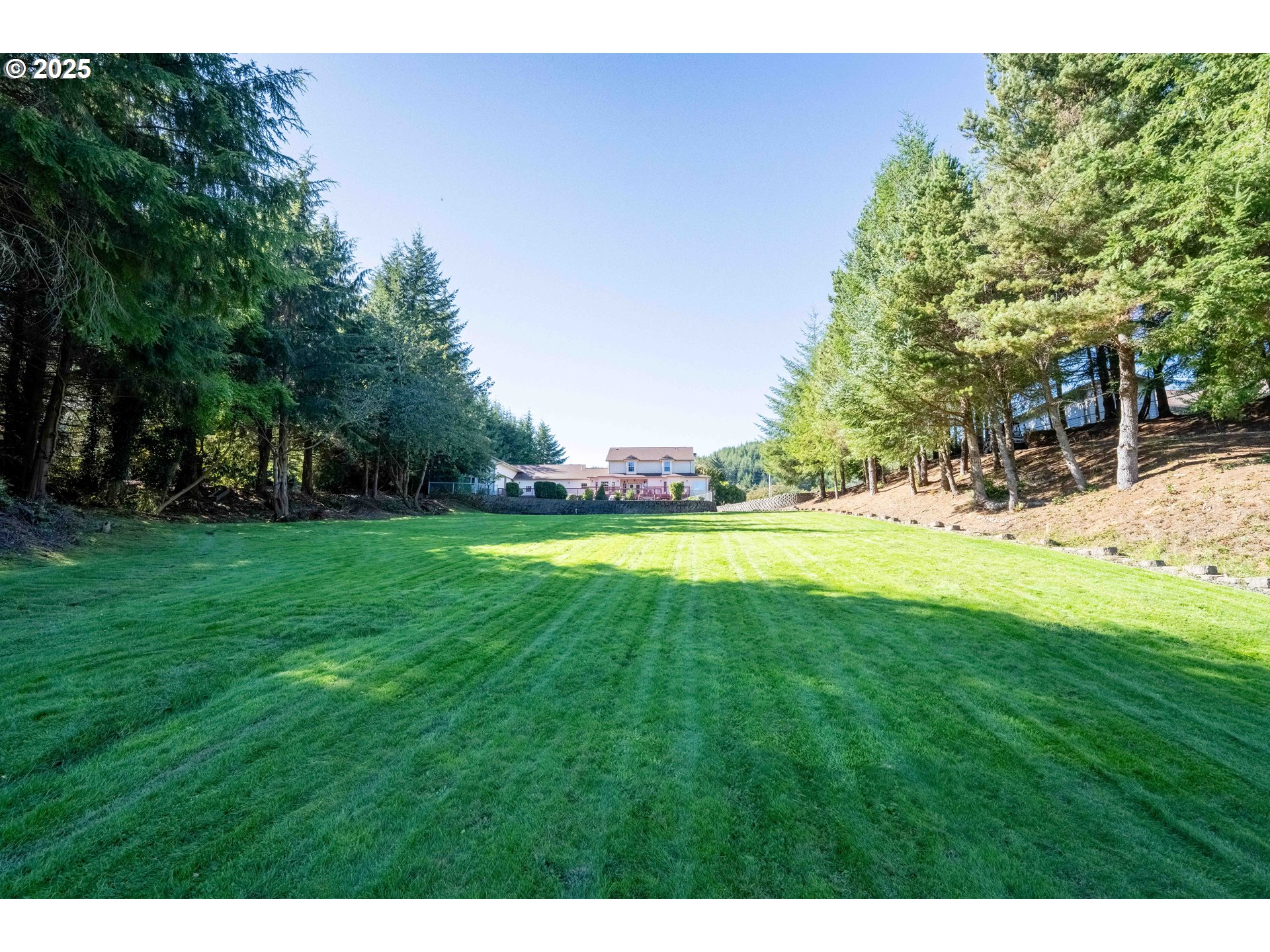 729 Ranch Road Reedsport, OR 97467 - Photo 11 of 48 a view of outdoor space with garden and trees