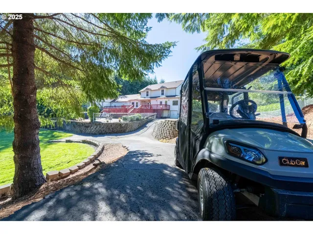 a view of a swimming pool with a chair and tables