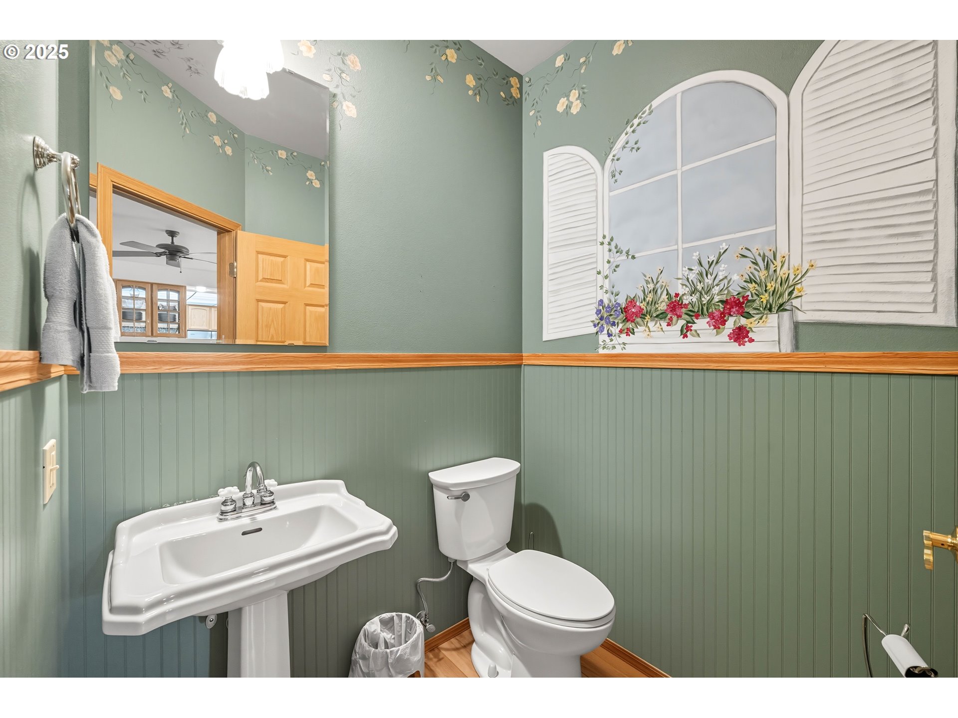 729 Ranch Road Reedsport, OR 97467 - Photo 30 of 48 a bathroom with a toilet sink and mirror