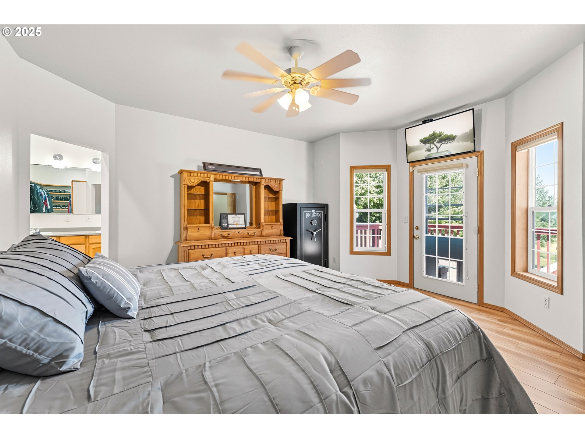 729 Ranch Road Reedsport, OR 97467 - Photo 31 of 48 a bedroom with a large bed and a window