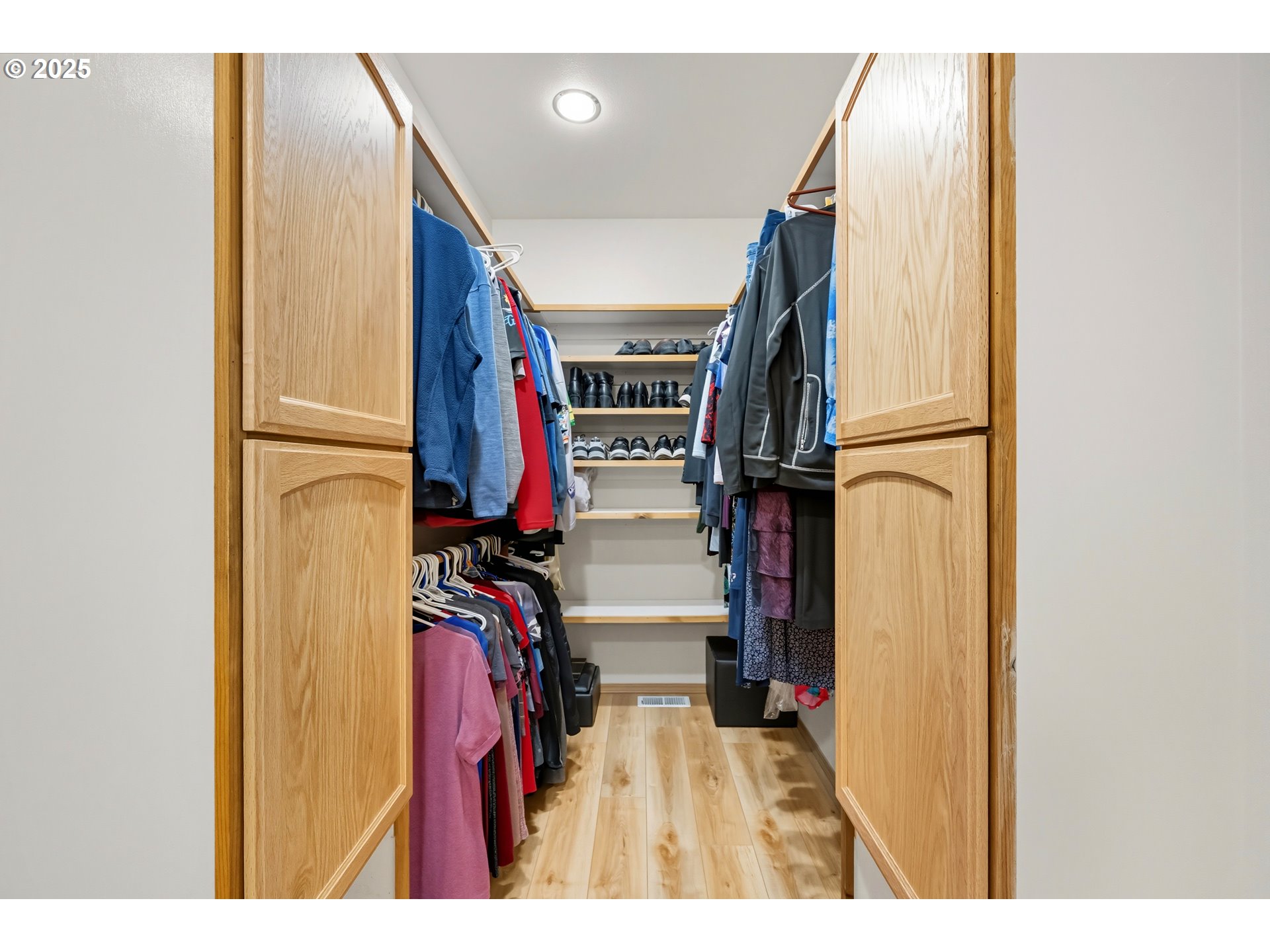 729 Ranch Road Reedsport, OR 97467 - Photo 34 of 48 a view of walk in closet with clothes and shoes