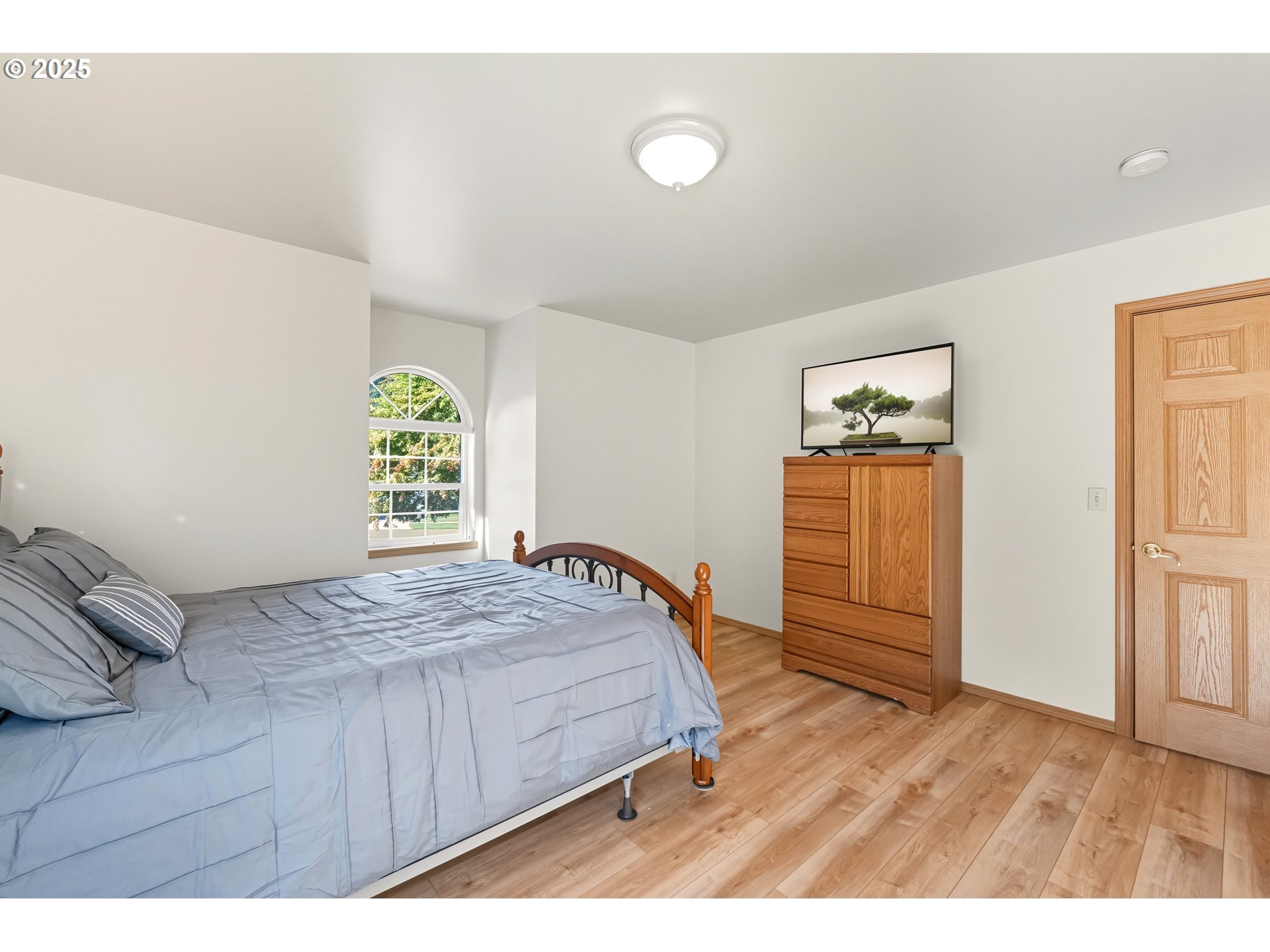 729 Ranch Road Reedsport, OR 97467 - Photo 36 of 48 a bedroom with a bed and a window