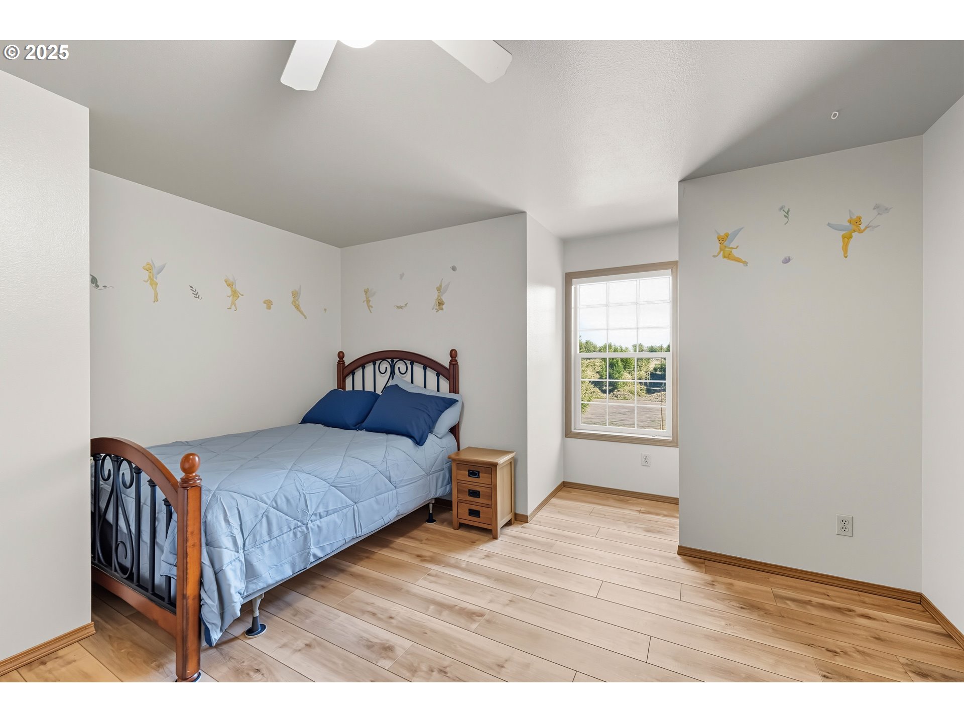 729 Ranch Road Reedsport, OR 97467 - Photo 38 of 48 a bedroom with a bed and a window