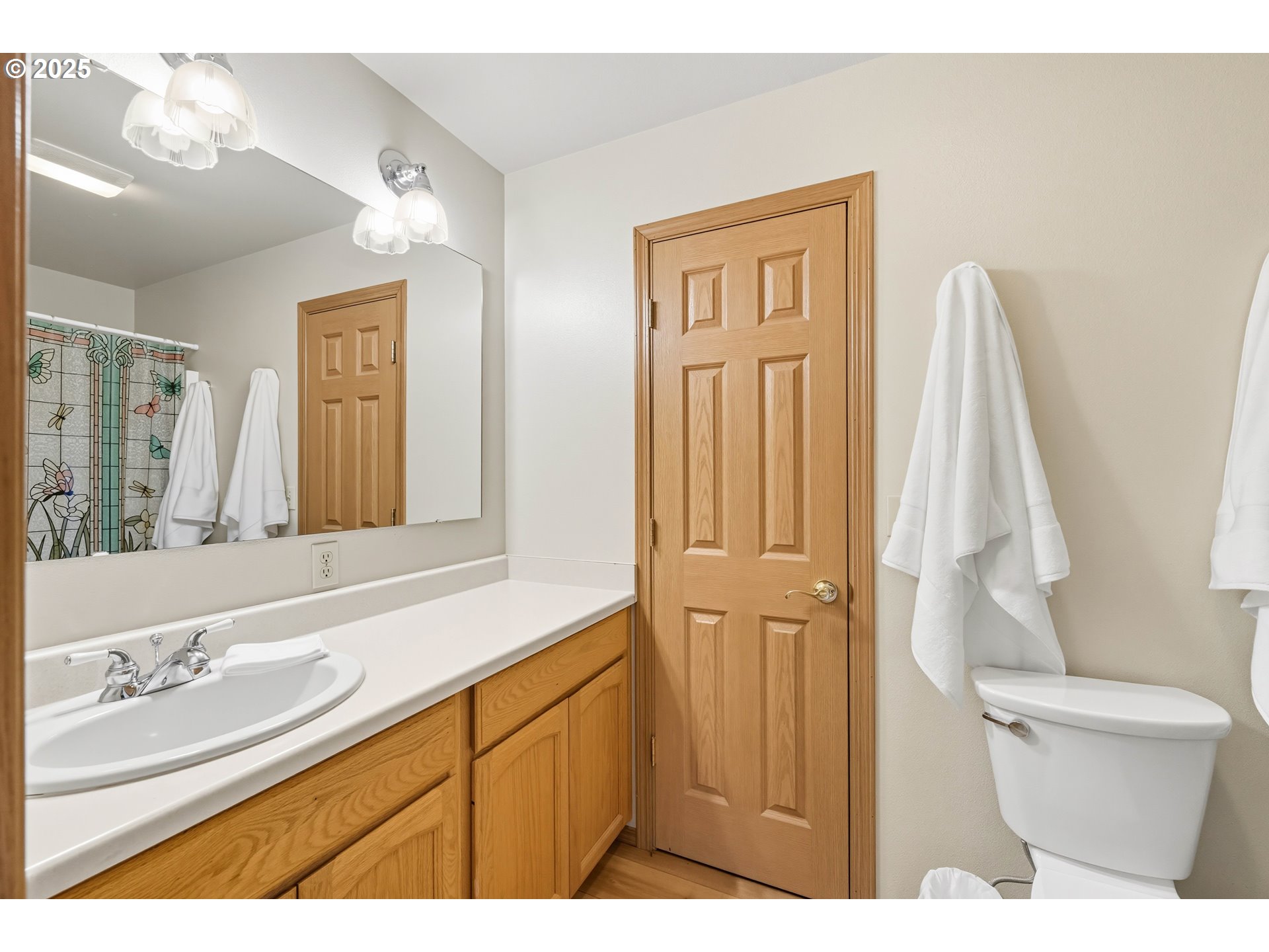 729 Ranch Road Reedsport, OR 97467 - Photo 39 of 48 a bathroom with a sink a toilet and a mirror