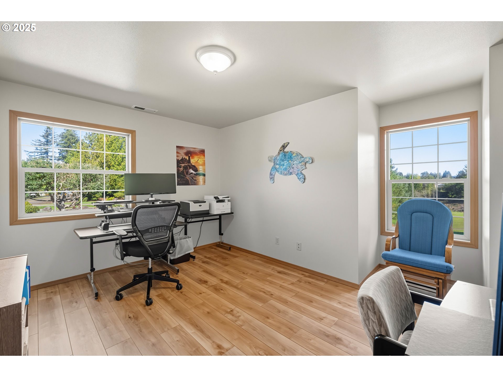 729 Ranch Road Reedsport, OR 97467 - Photo 40 of 48 a workspace with furniture hardwood and a window