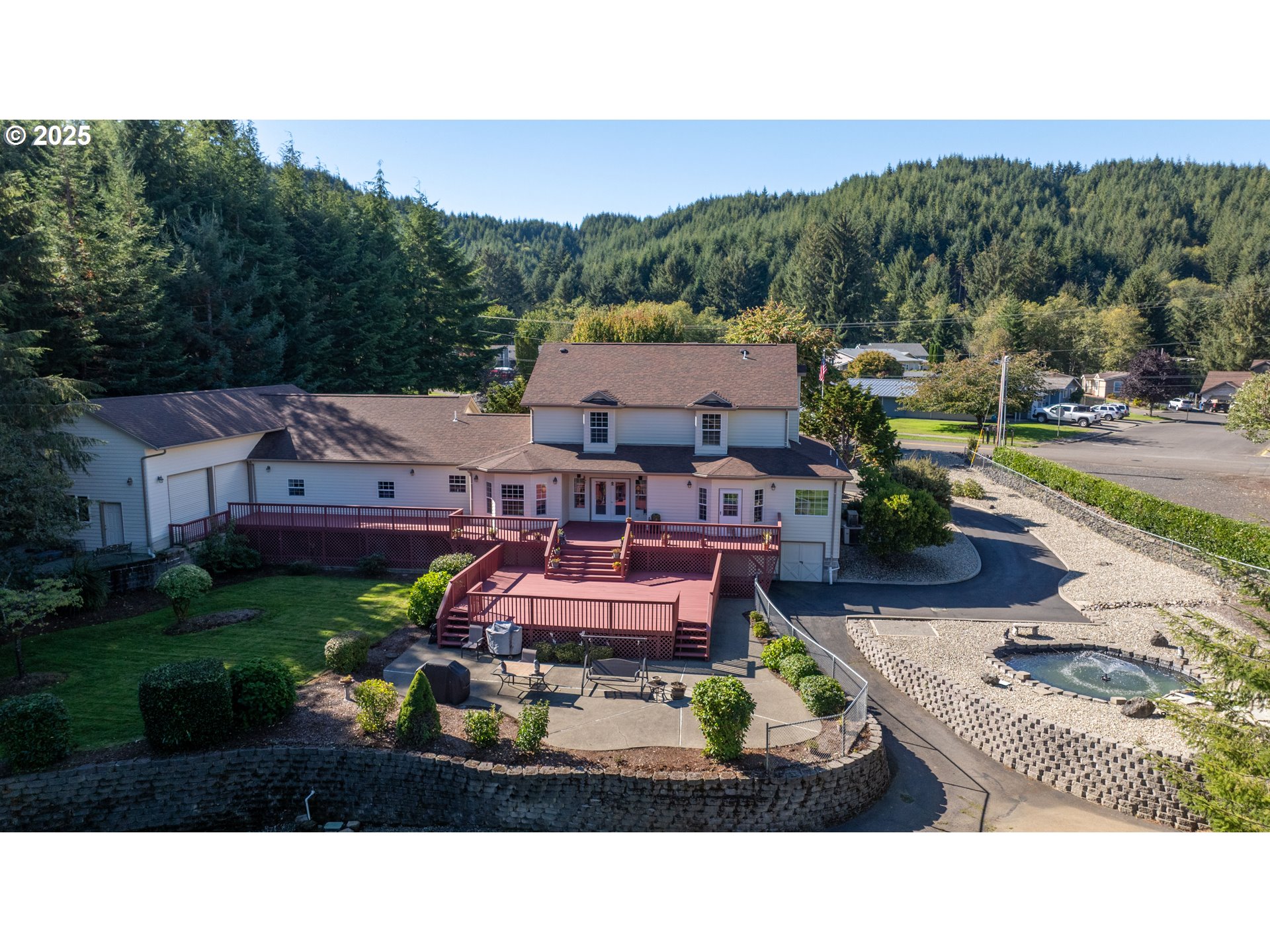 729 Ranch Road Reedsport, OR 97467 - Photo 7 of 48 a aerial view of a house with a garden
