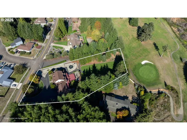 wooden floor in a hall with an empty room
