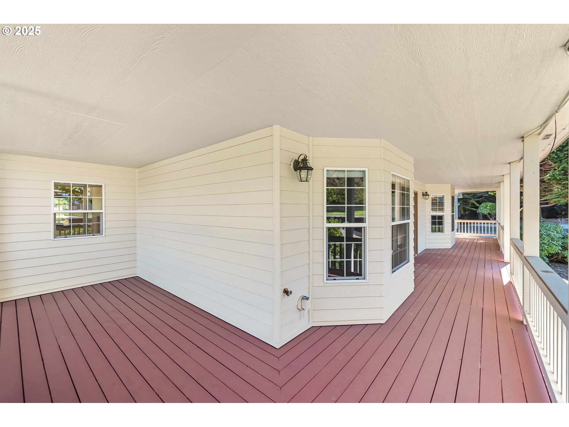 729 Ranch Road Reedsport, OR 97467 - Photo 10 of 48 wooden floor in a hall with an empty room