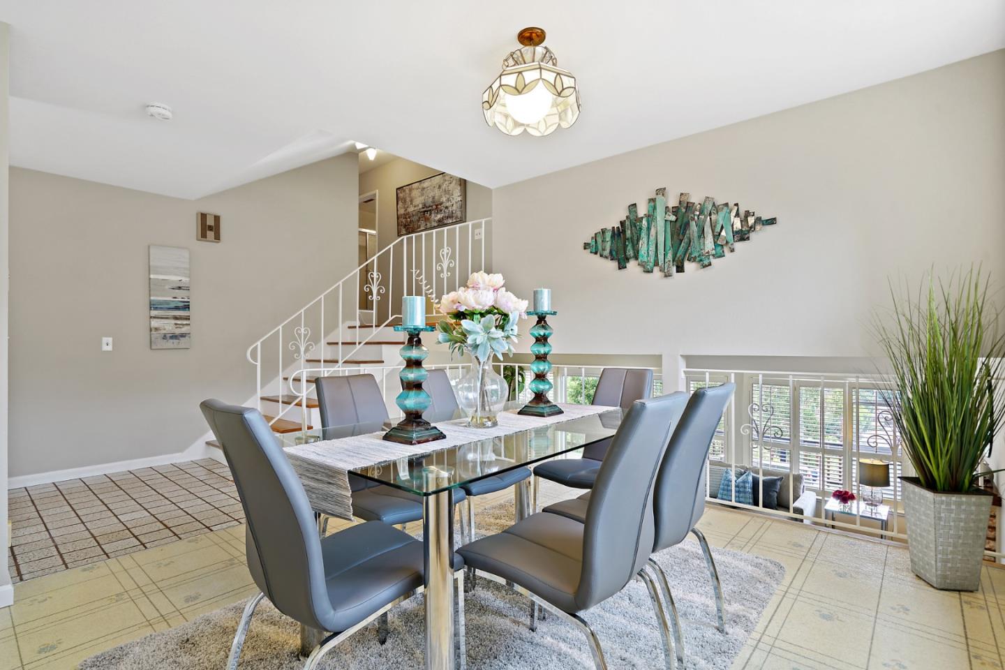 1511 Ridge Road Belmont, CA 94002 - Photo 20 of 50 a view of a dining room with furniture wooden floor and chandelier