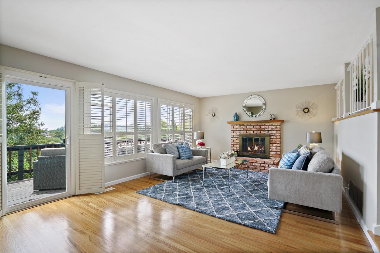 1511 Ridge Road Belmont, CA 94002 - Photo 26 of 50 a living room with furniture and a fireplace