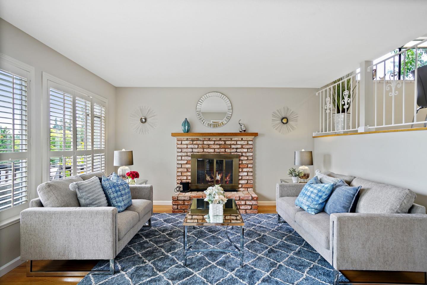1511 Ridge Road Belmont, CA 94002 - Photo 27 of 50 a living room with furniture and a fireplace