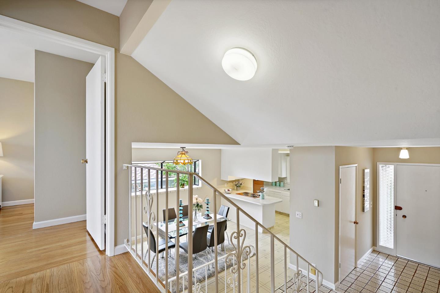 1511 Ridge Road Belmont, CA 94002 - Photo 38 of 50 a view of a livingroom with wooden floor and stairs