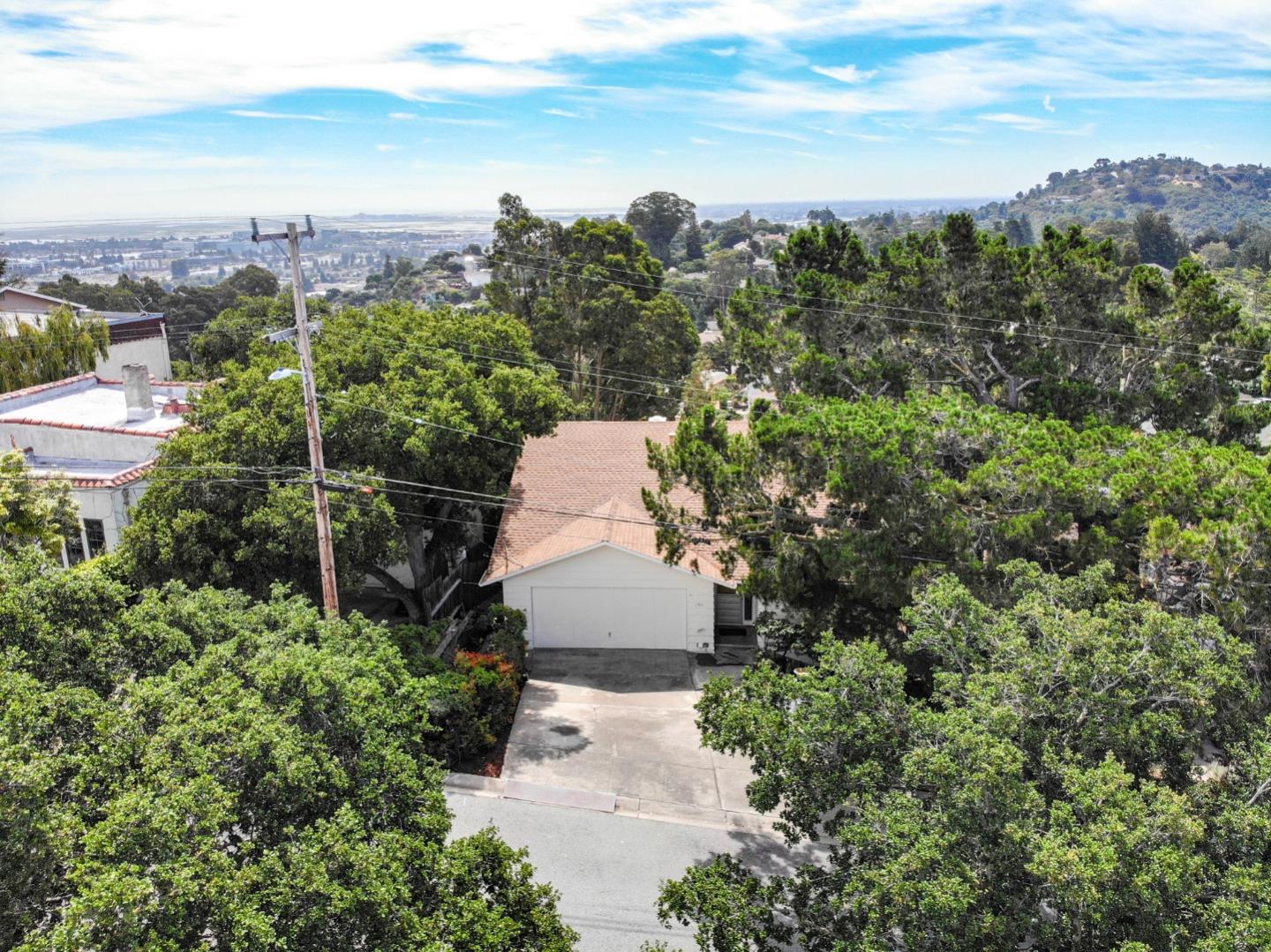 1511 Ridge Road Belmont, CA 94002 - Photo 4 of 50 an aerial view of a house with mountain view