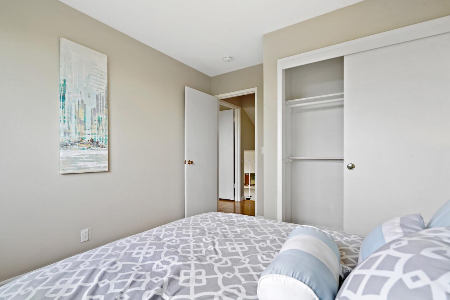 1511 Ridge Road Belmont, CA 94002 - Photo 42 of 50 a bedroom with a bed and a window