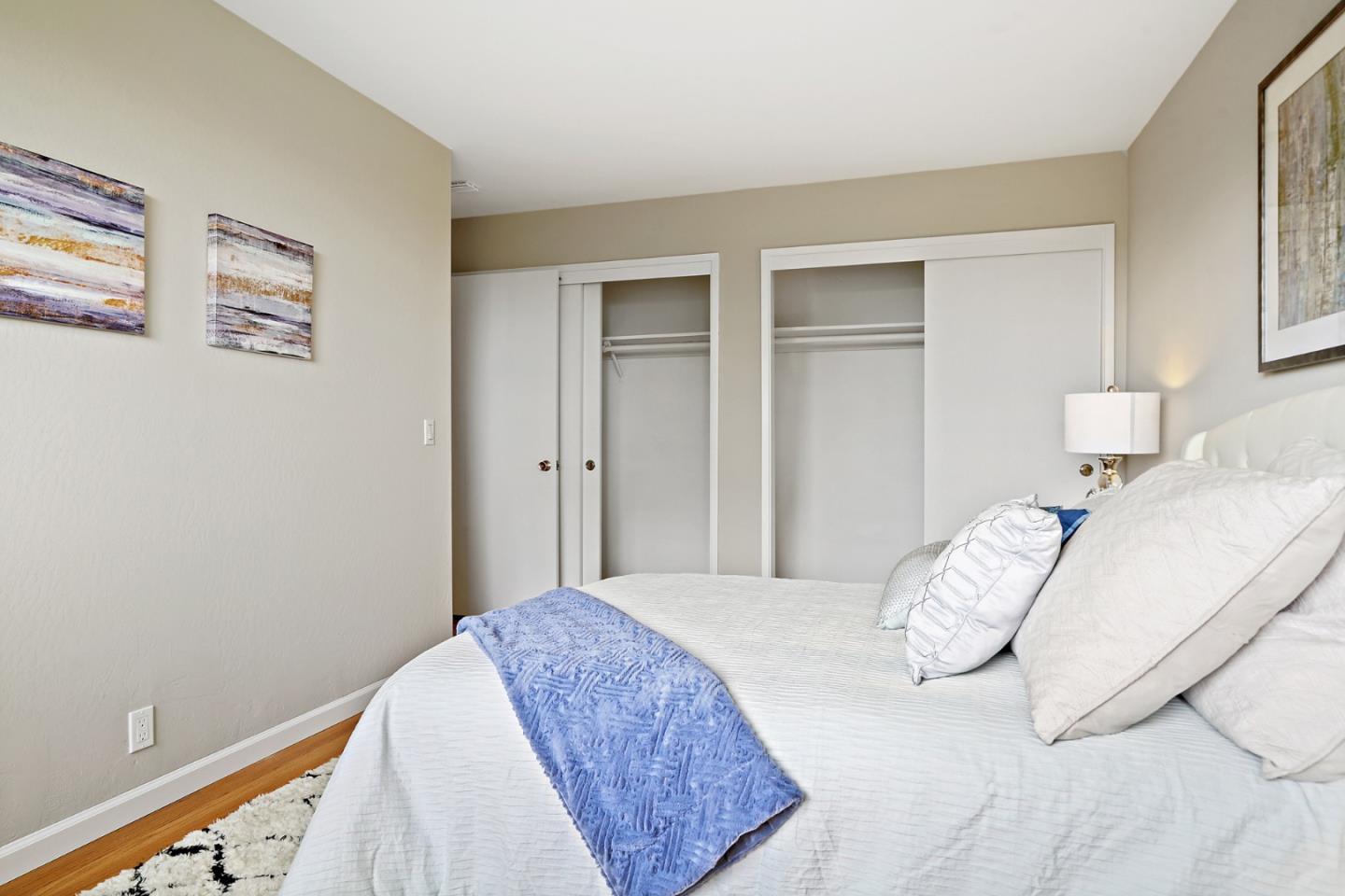 1511 Ridge Road Belmont, CA 94002 - Photo 44 of 50 a bedroom with a bed and a window