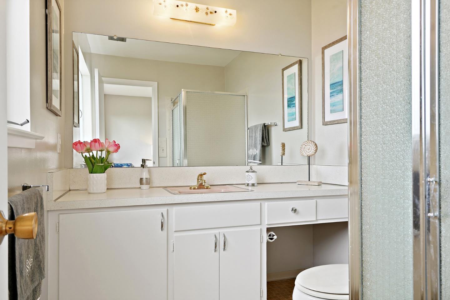 1511 Ridge Road Belmont, CA 94002 - Photo 46 of 50 a bathroom with a sink vanity mirror and toilet