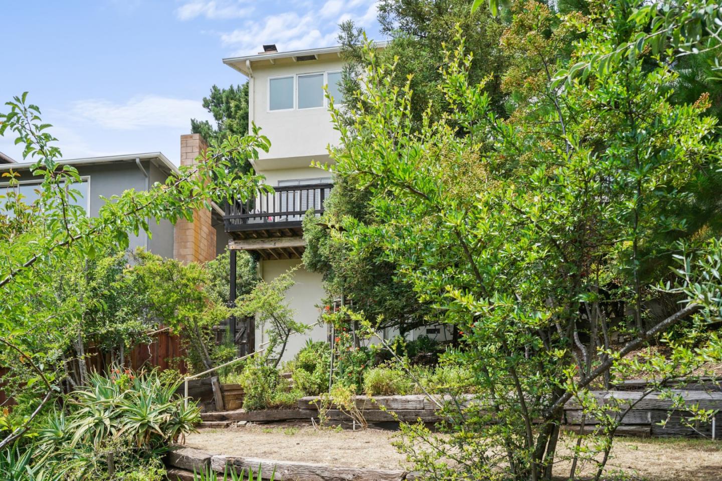 1511 Ridge Road Belmont, CA 94002 - Photo 50 of 50 front view of a house with a tree