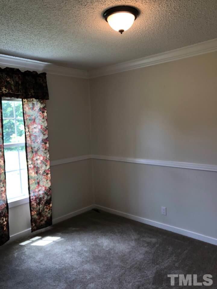 855 Chub Lake Loop Road Roxboro, NC 27574 - Photo 13 of 24 a view of a garage