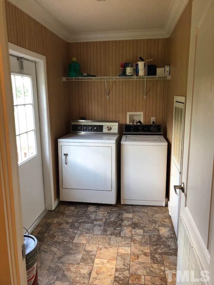 855 Chub Lake Loop Road Roxboro, NC 27574 - Photo 18 of 24 a utility room with dryer and washer