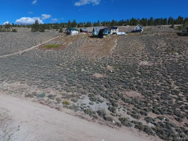 a view of a house with a street