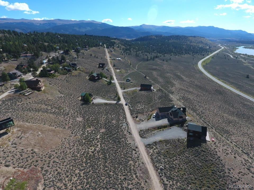 445 Mt Hope Road Twin Lakes, CO 81251 - Photo 3 of 17 a view of a backyard with wooden fence