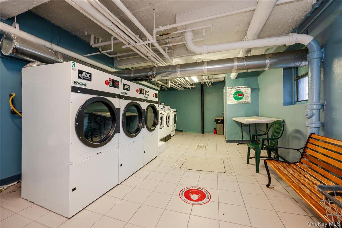 1 Remsen Road, Unit 4J Yonkers, NY 10710 - Photo 13 of 15 a utility room with dryer and washer