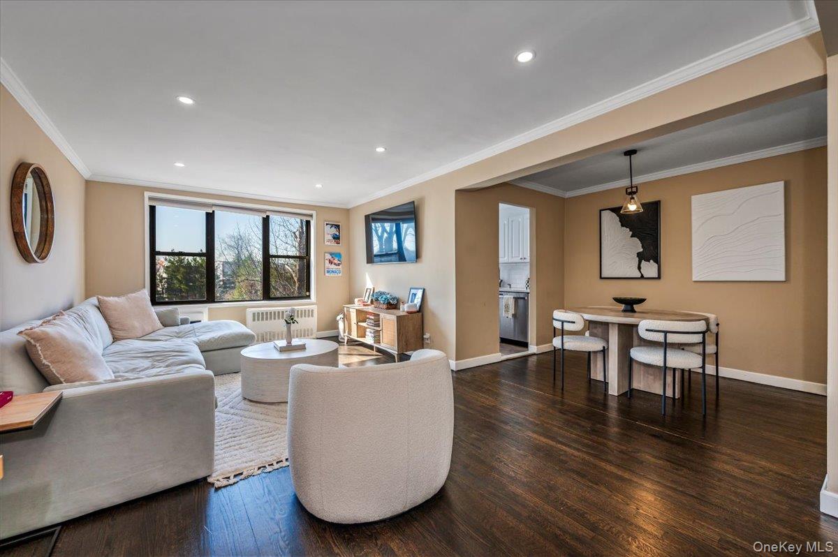 1 Remsen Road, Unit 4J Yonkers, NY 10710 - Photo 2 of 15 a living room with furniture and a large window