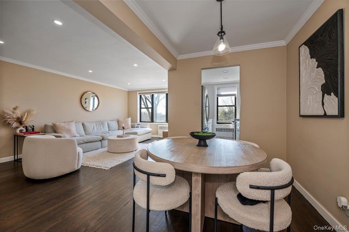 1 Remsen Road, Unit 4J Yonkers, NY 10710 - Photo 7 of 15 a living room with furniture and a table