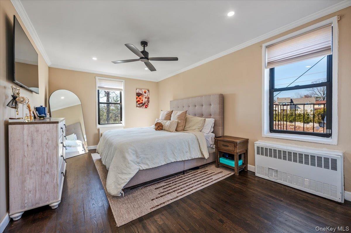 1 Remsen Road, Unit 4J Yonkers, NY 10710 - Photo 9 of 15 a bedroom with a bed wooden floor and window