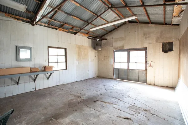 a view of livingroom with furniture and windows