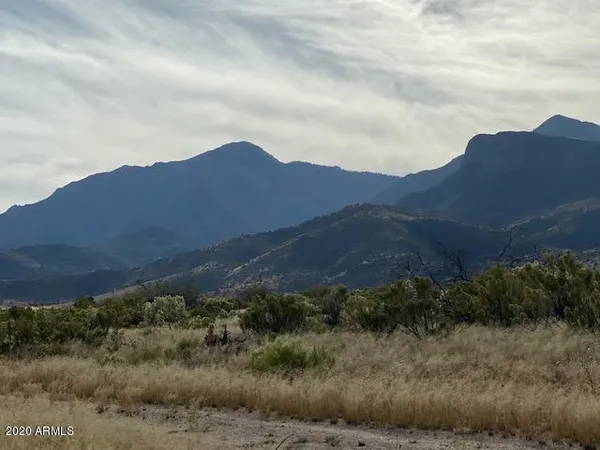 a view of a house with a street