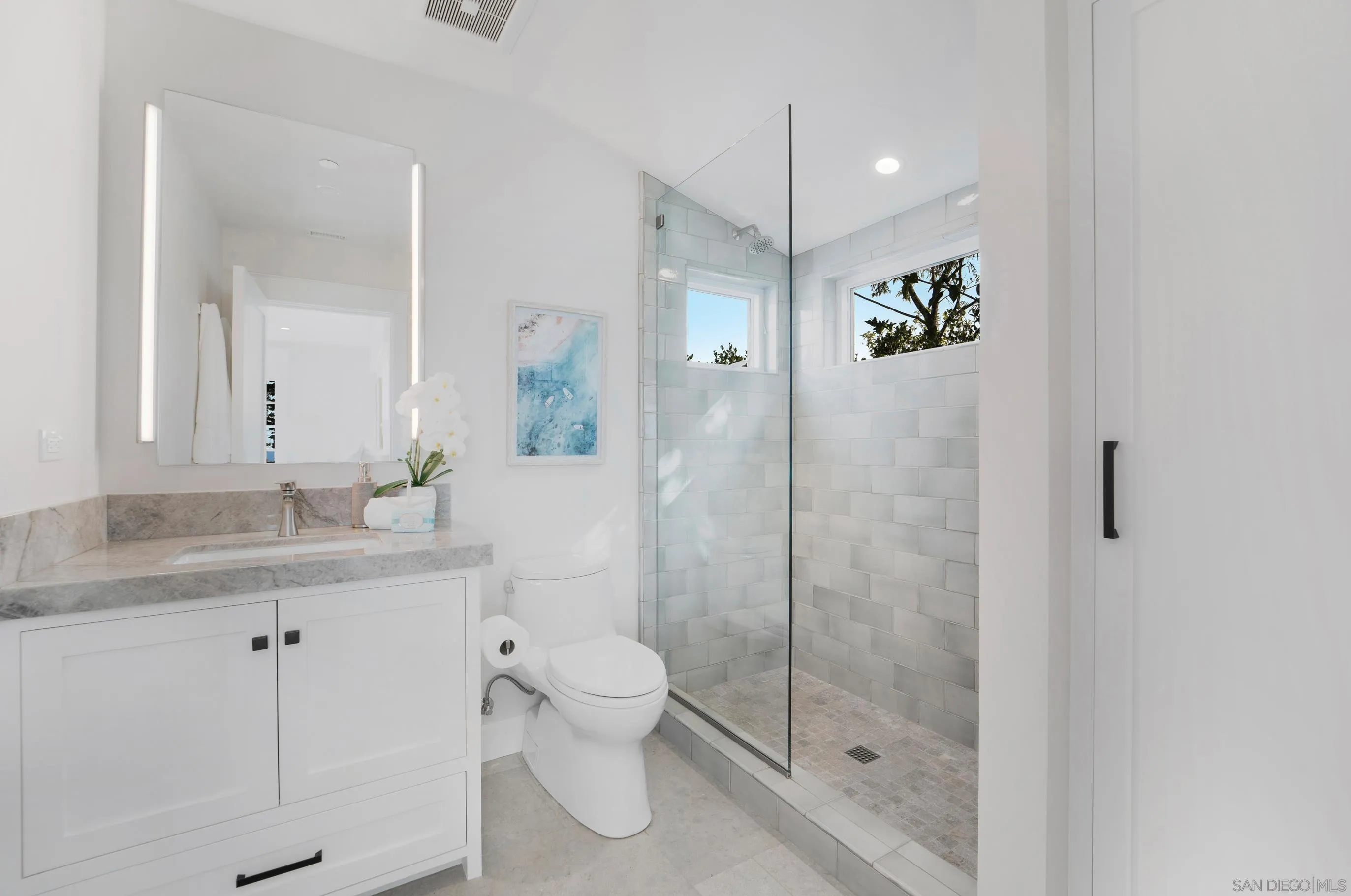 1145 Crest Road Del Mar, CA 92014 - Photo 38 of 57 a bathroom with a shower toilet and sink