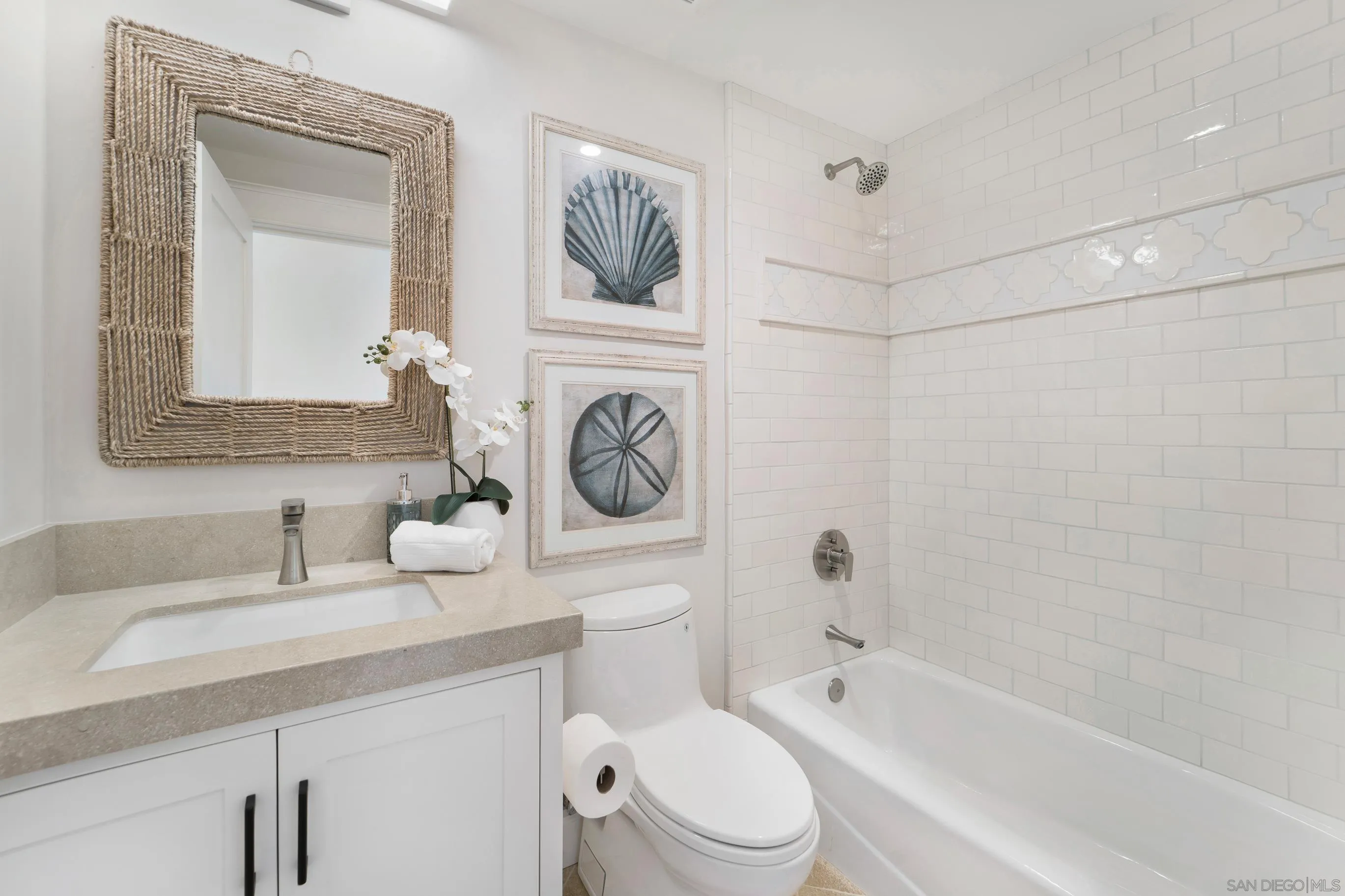 1145 Crest Road Del Mar, CA 92014 - Photo 40 of 57 a bathroom with a sink a toilet and shower