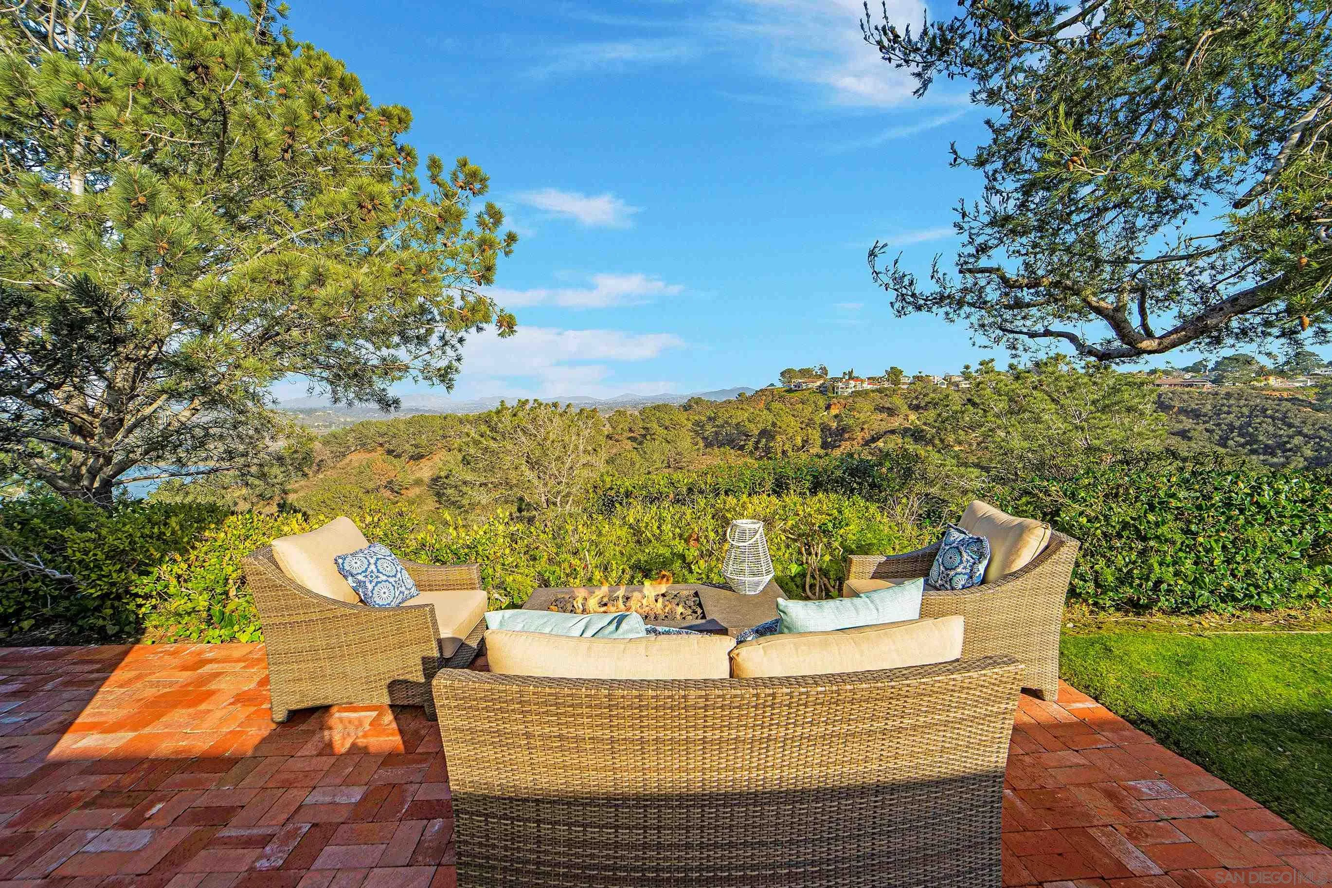 1145 Crest Road Del Mar, CA 92014 - Photo 45 of 57 a view of a house with a yard