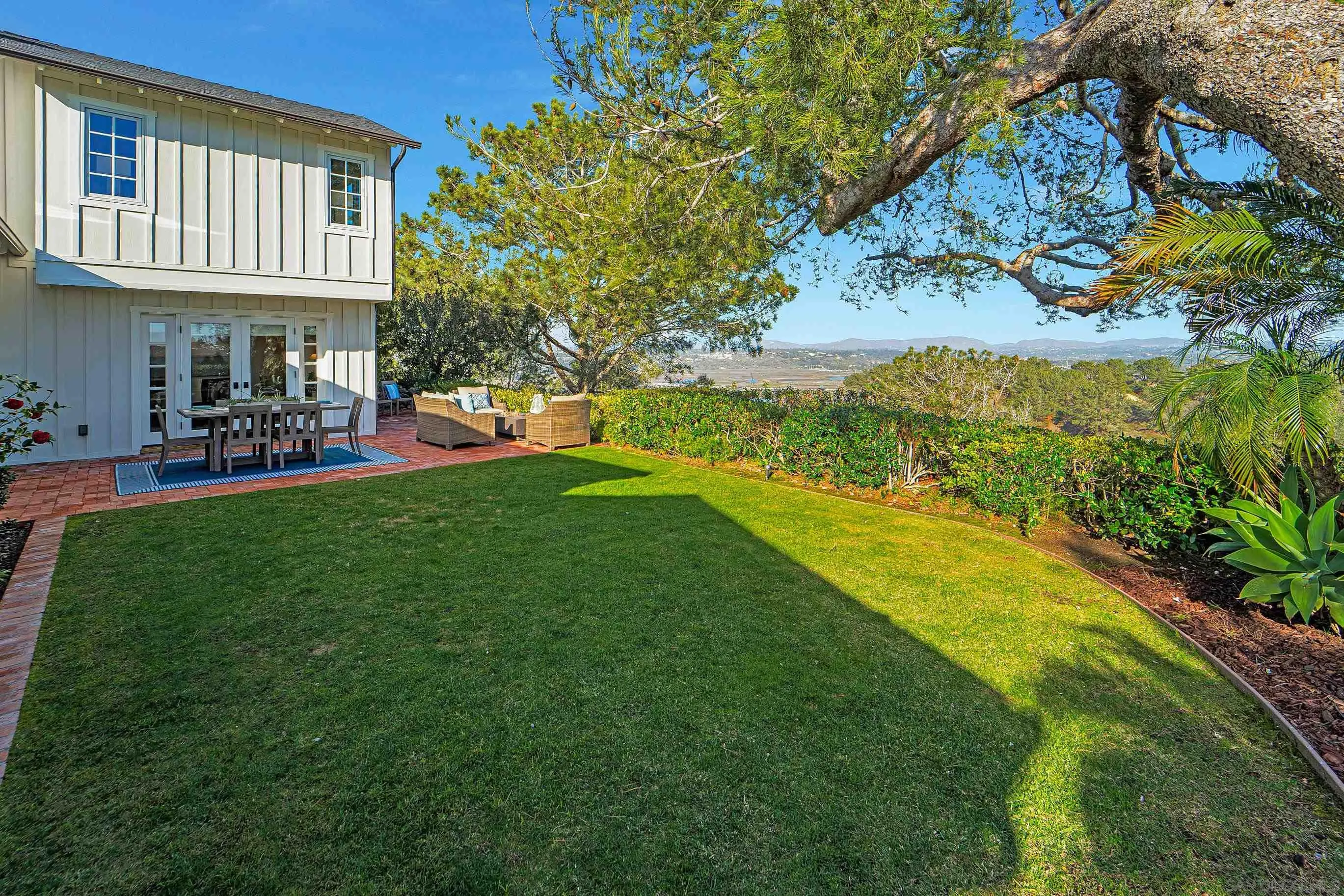 1145 Crest Road Del Mar, CA 92014 - Photo 47 of 57 a view of a house with a yard porch and sitting area