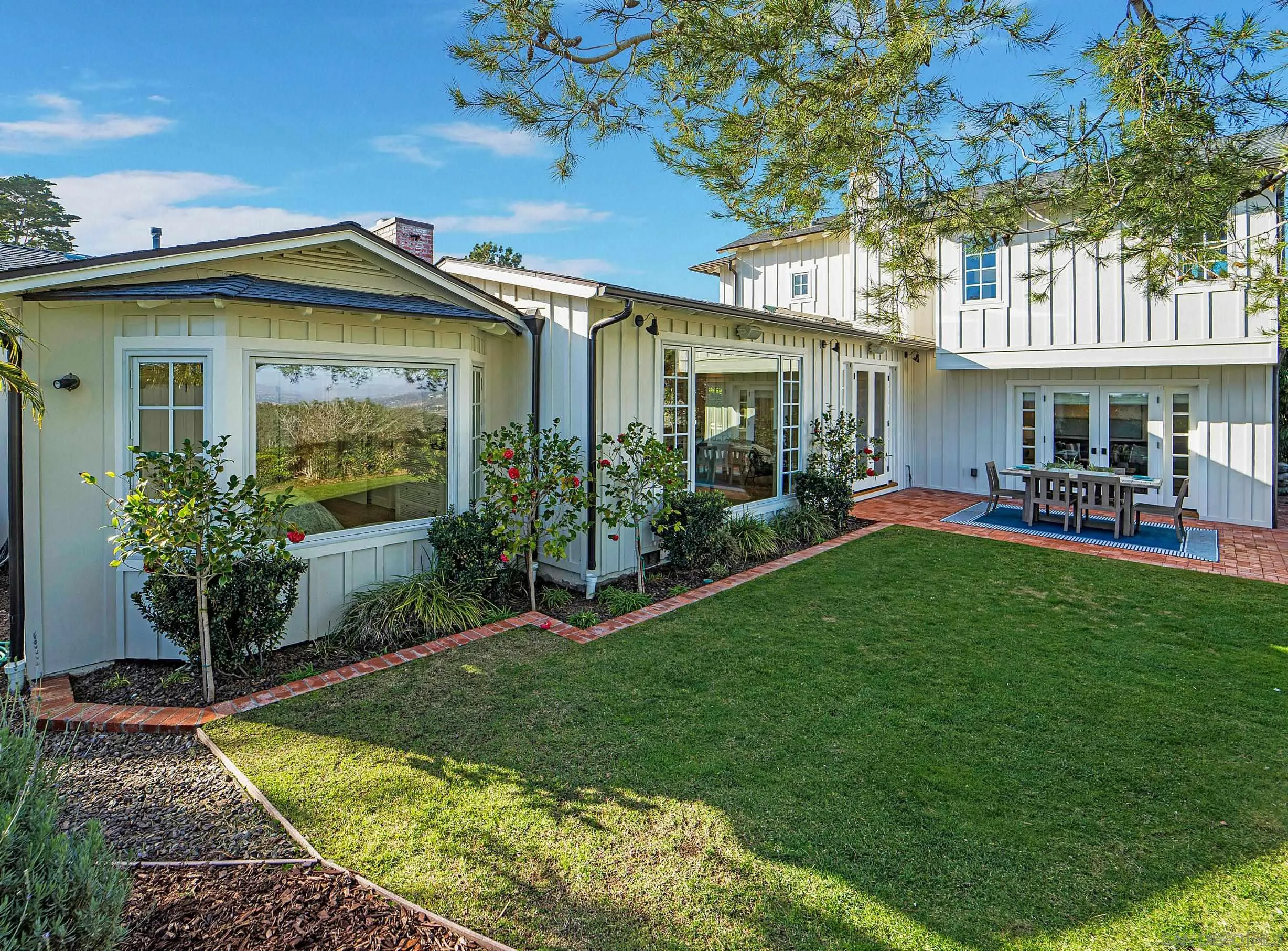 1145 Crest Road Del Mar, CA 92014 - Photo 48 of 57 a view of a house with a garden