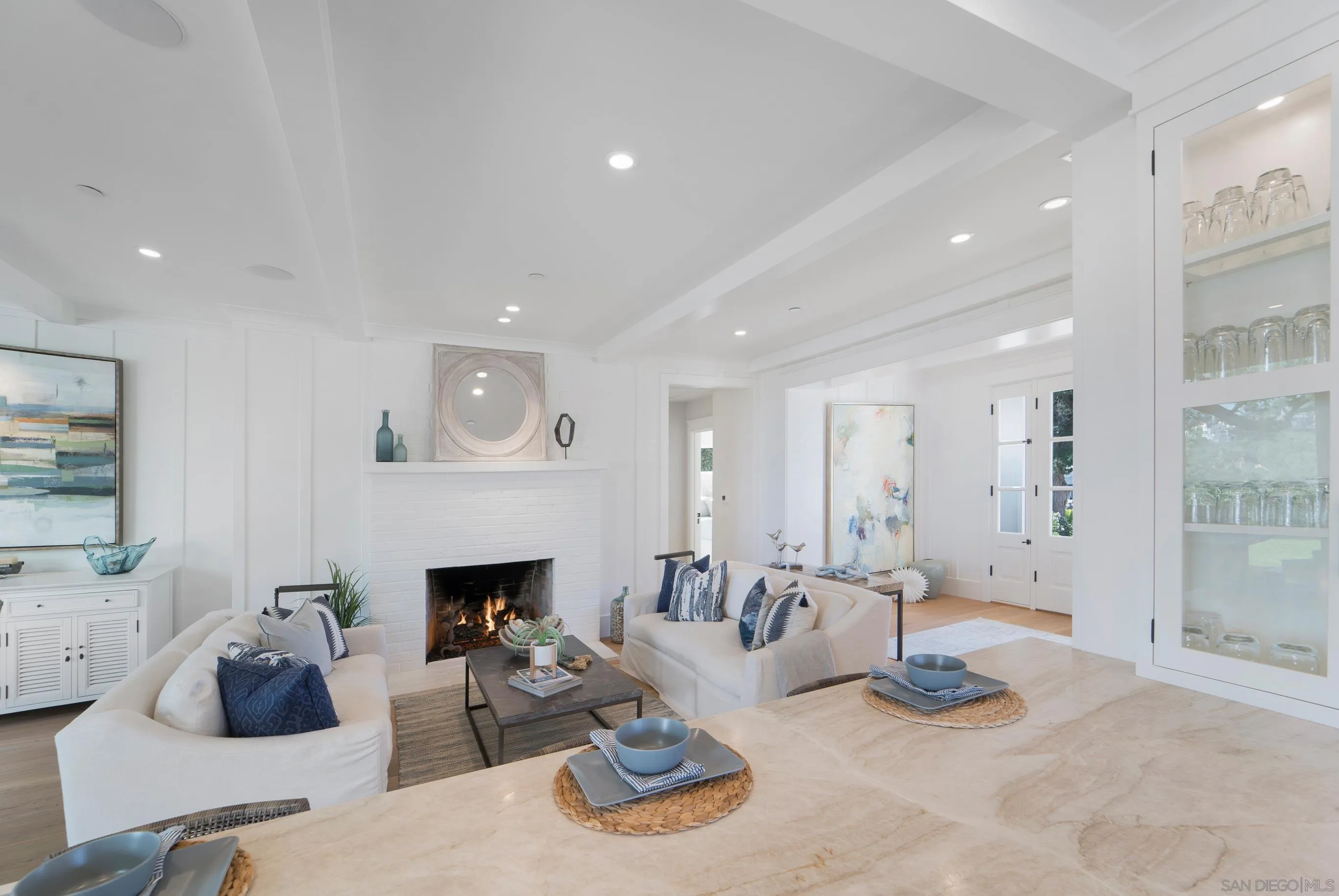1145 Crest Road Del Mar, CA 92014 - Photo 5 of 57 a living room with furniture and a fireplace
