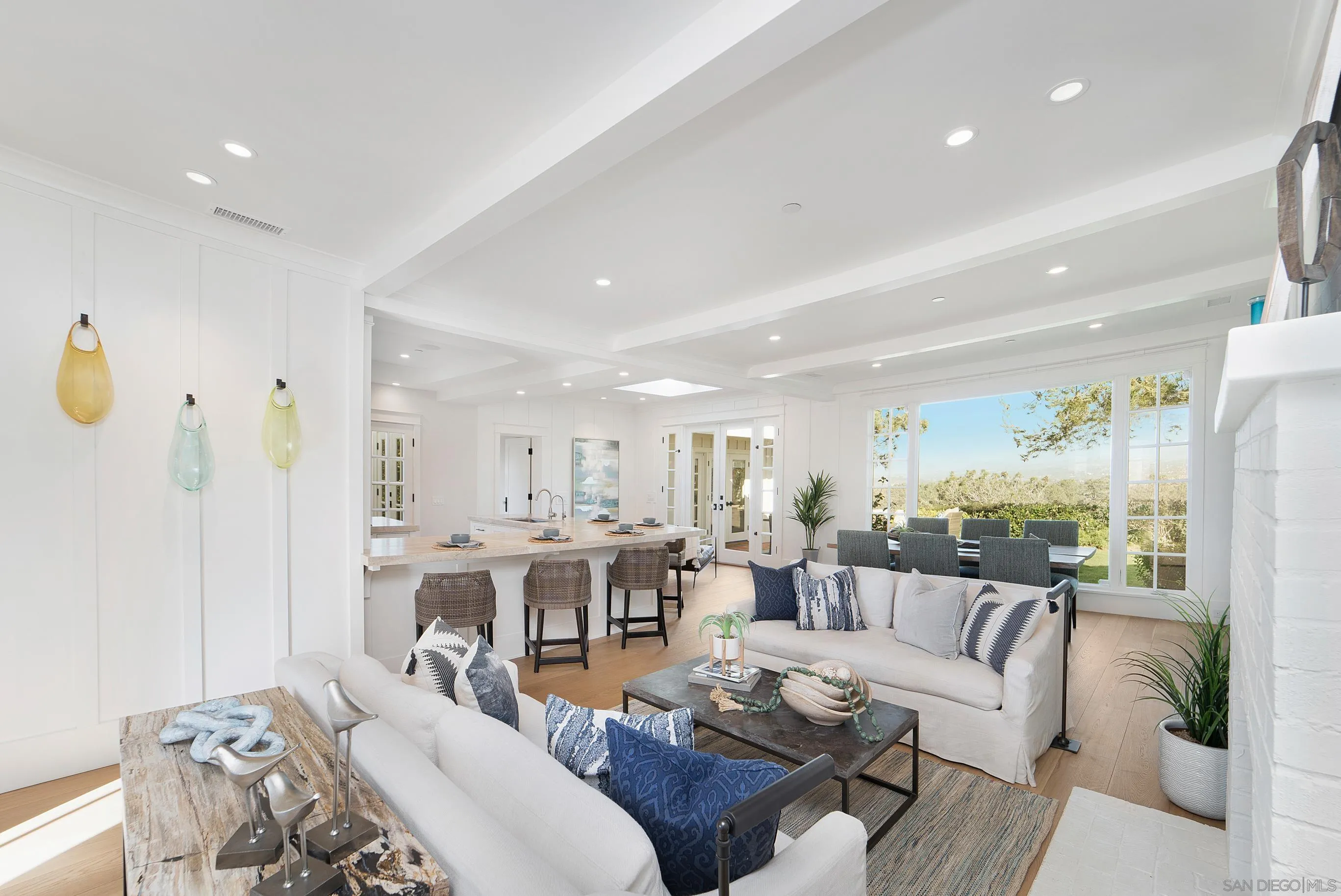 1145 Crest Road Del Mar, CA 92014 - Photo 6 of 57 a living room with furniture kitchen view and a large window