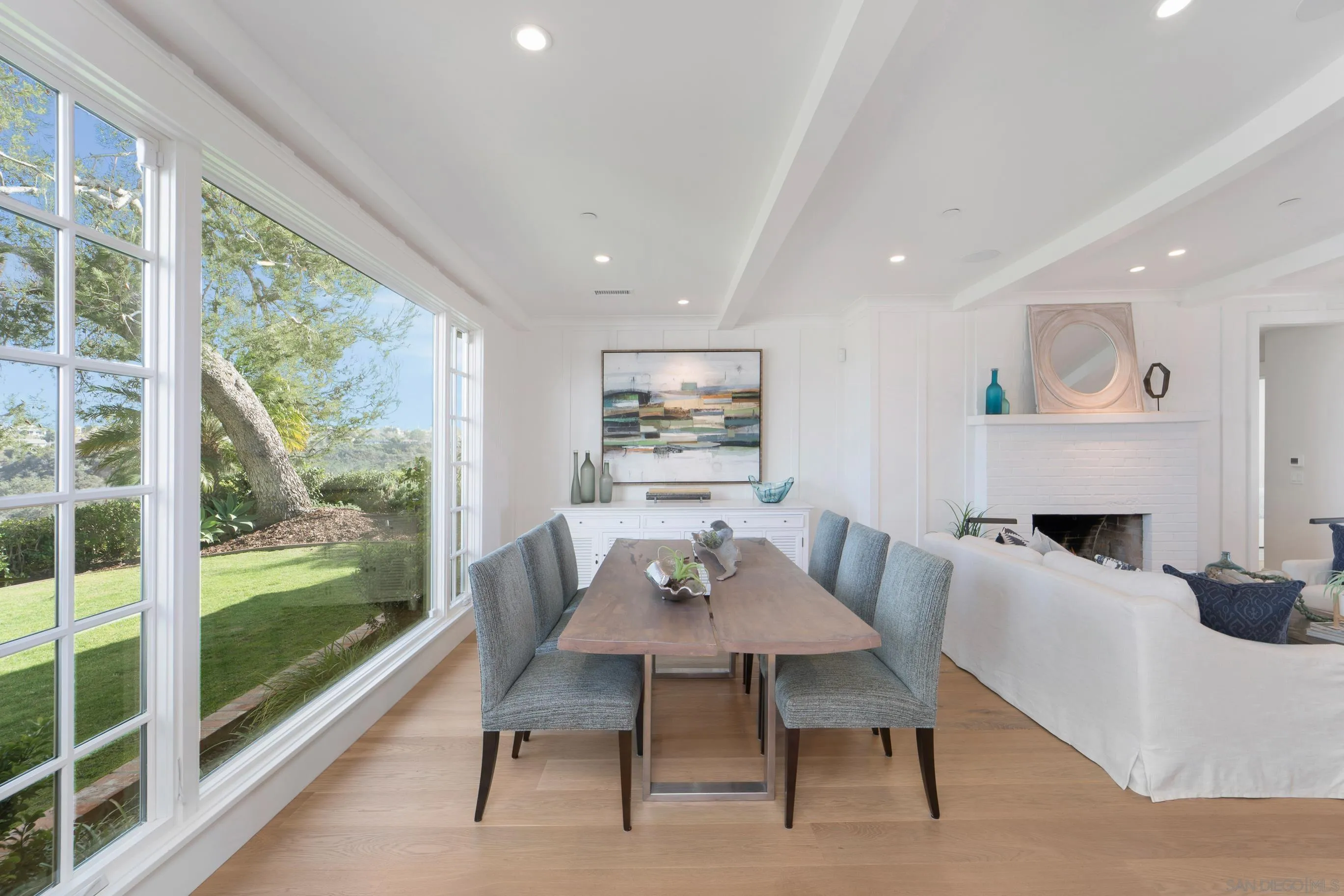 1145 Crest Road Del Mar, CA 92014 - Photo 7 of 57 a view of a dining room with furniture window and wooden floor