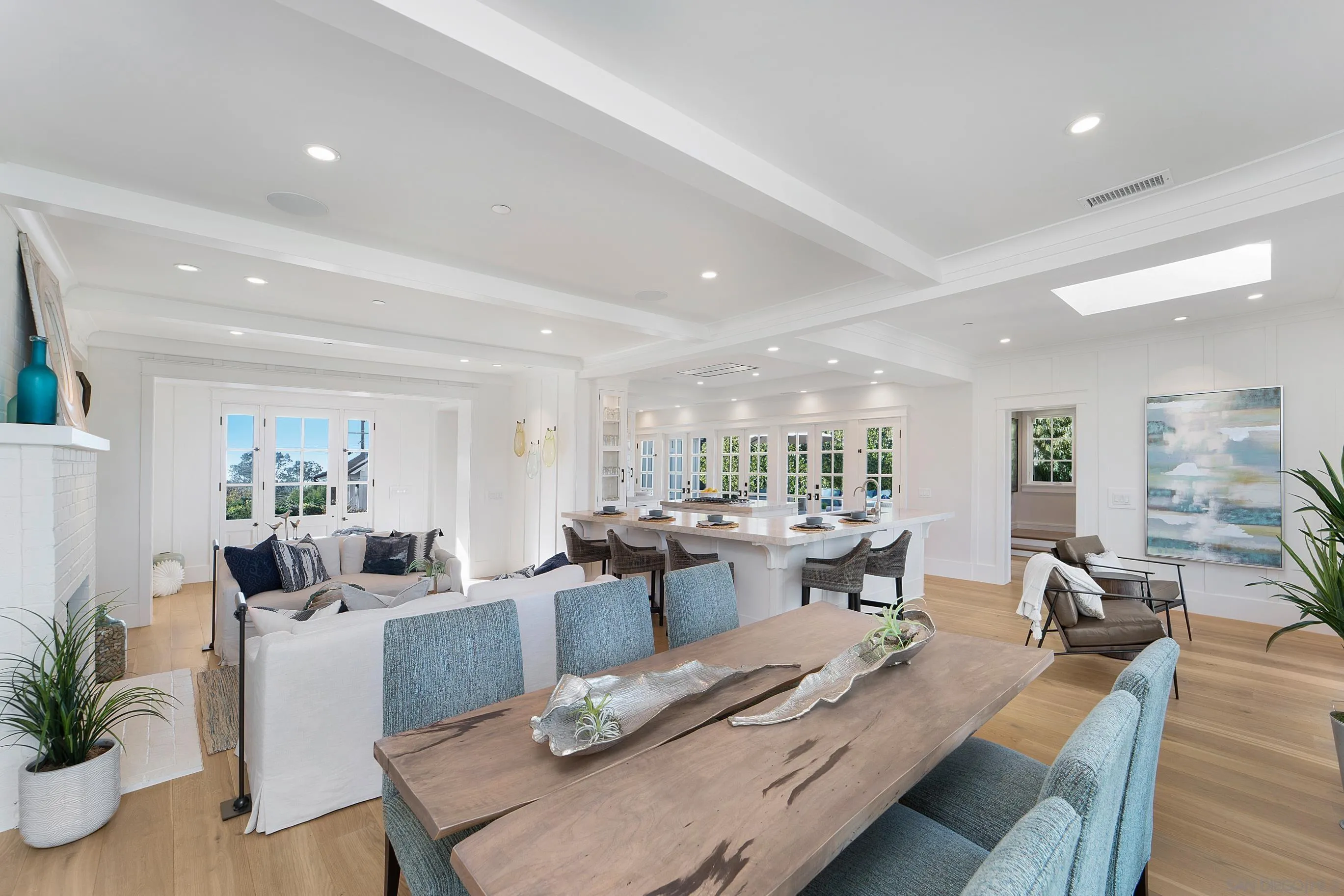 1145 Crest Road Del Mar, CA 92014 - Photo 9 of 57 a large kitchen with a table and chairs