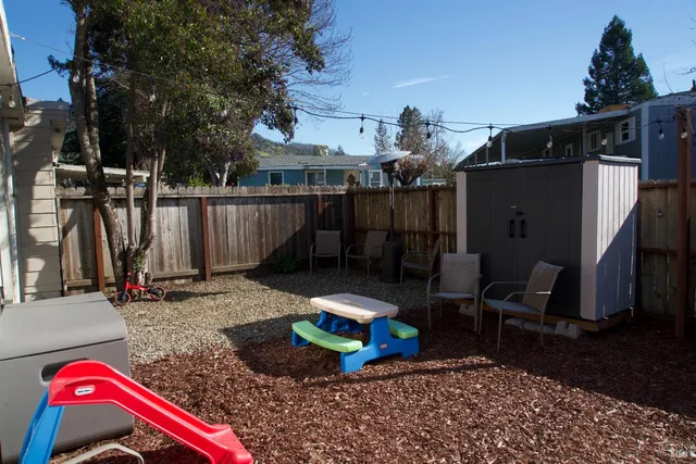 a view of a lake in a forest