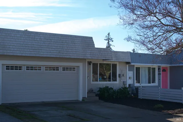 a vase of flowers sitting on a table