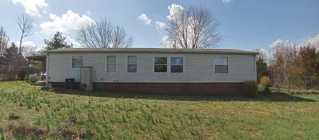 412 Martin Chapel Road Portland, TN 37148 - Photo 3 of 12 a front view of a house with garden