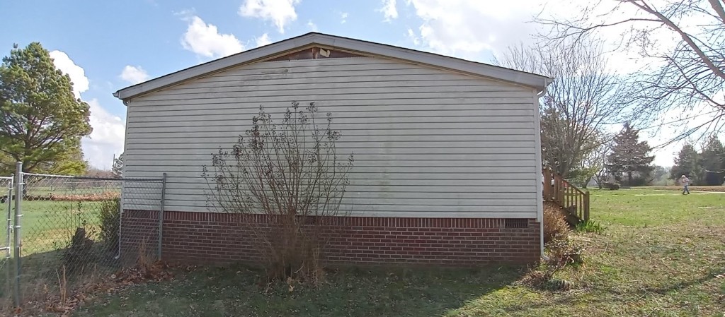 412 Martin Chapel Road Portland, TN 37148 - Photo 6 of 12 a view of a backyard with pathway