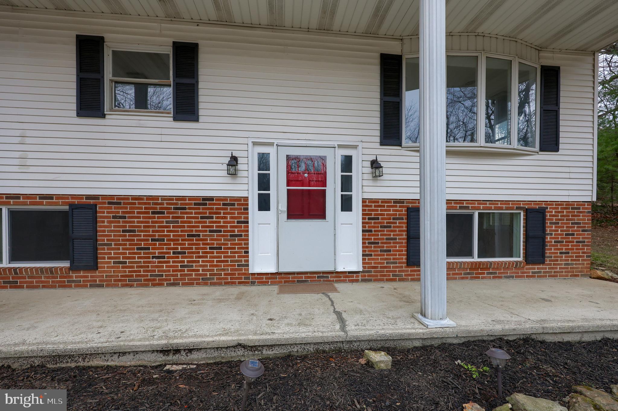 470 Oak Hollow Road Red Lion, PA 17356 - Photo 4 of 84 a front view of a house with a yard